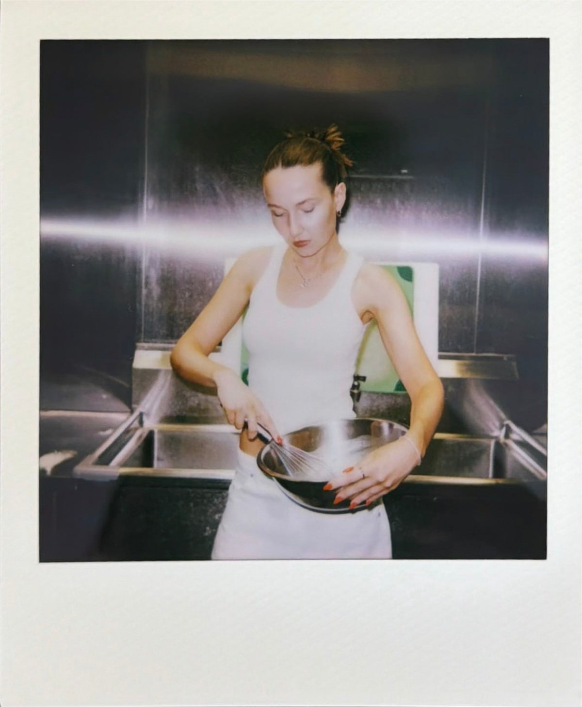 alay, in the kitchen. hands, work surface, batch in progress. warm, not clinical.